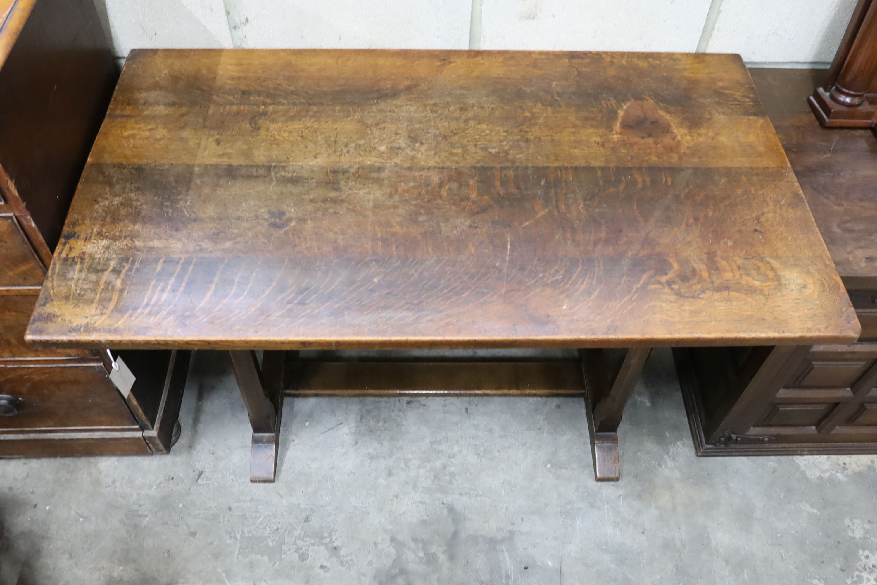 A small rectangular Arts and Crafts oak refectory table, length 121cm, depth 69cm, height 73cm